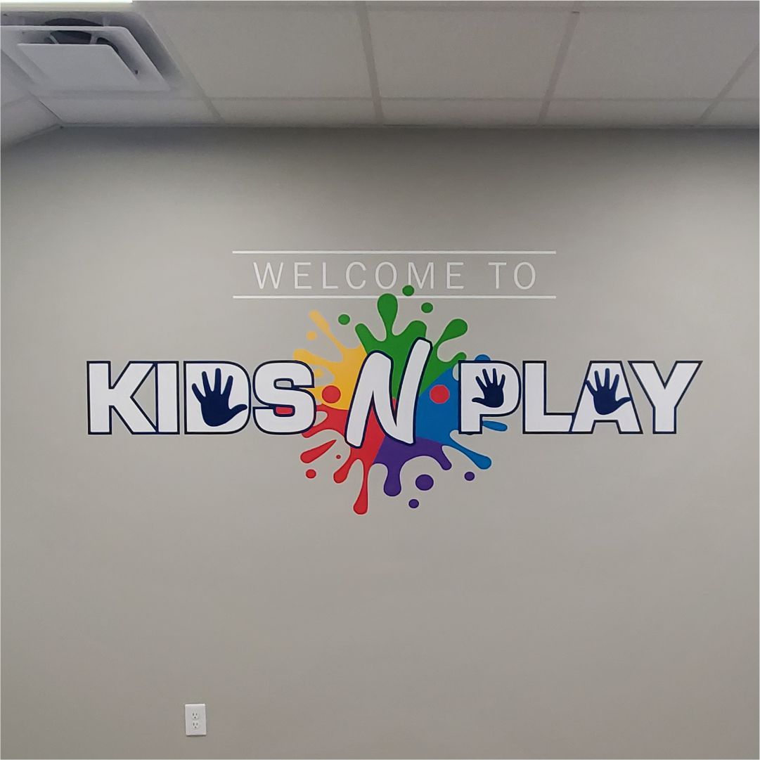 Kids N' Play signs